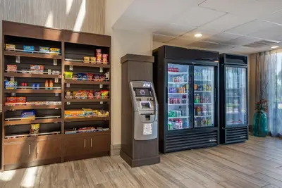 a grocery store with a drink cooler and a refrigerator at MainStay Suites Horsham - Philadelphia in Horsham