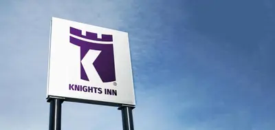 a sign for a krispy kitties inn at Knights Inn Center Valley in Center Valley