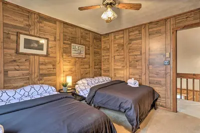 a bedroom with two beds and a ceiling fan at Resort Perks Picturesque Poconos Getaway! in Bushkill