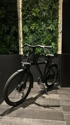 a black bike parked in front of a building at Nap York Central Park Sleep Station in New York