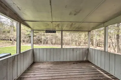 an empty porch with windows and a sign on it at 7 Mi to Big Boulder Mountain Poconos Escape! in Albrightsville