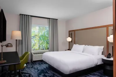 a hotel room with a bed and a window at Fairfield by Marriott Inn & Suites Lebanon Near Expo Center in Lebanon
