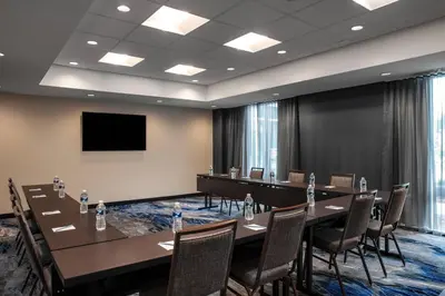a conference room with a long table and chairs at Fairfield by Marriott Inn & Suites Lebanon Near Expo Center in Lebanon