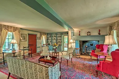 a living room filled with furniture and a fireplace at Pool and Courtyard Timeless Home in Lansdale in Lansdale