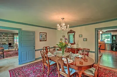 a dining room with a table and chairs at Pool and Courtyard Timeless Home in Lansdale in Lansdale