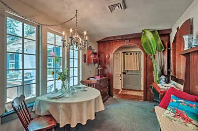 a dining room with a table and a desk at Pool and Courtyard Timeless Home in Lansdale in Lansdale