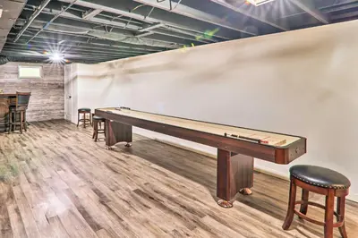 a pool table in a room with stools at Sunroom, Fire Pit and Sauna Lake Locust Village Gem in Pocono Lake