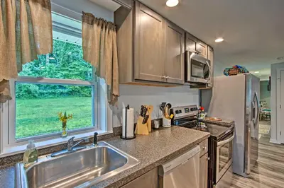 a kitchen with a sink and a window at 15 Mi to Camelback Resort! The Overlook Home in Brodheadsville