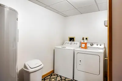 a small laundry room with a washer and dryer at Northridge 363 in Tannersville