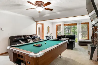 a living room with a pool table at Northridge 363 in Tannersville