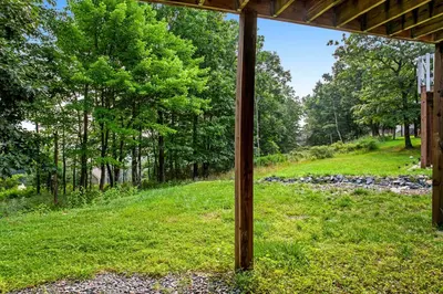 a view of a field from the porch of a cabin at Northridge 363 in Tannersville
