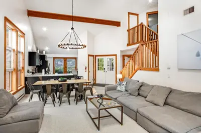 a living room with a couch and a table at Northridge 363 in Tannersville