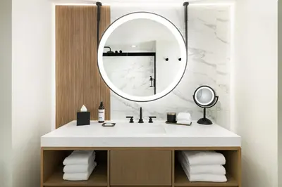 a bathroom with a sink and a mirror at Hyatt Regency Times Square in New York