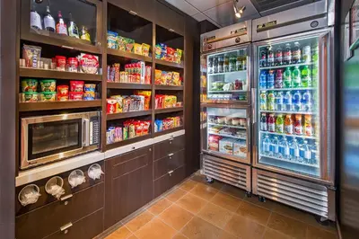 a refrigerator filled with lots of food and drinks at Courtyard by Marriott Secaucus Meadowlands in Secaucus