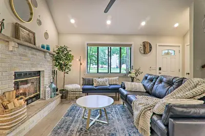 a living room with a couch and a fireplace at Relax Fireside! Retreat 15 Mi to Camelback Slopes in Tobyhanna