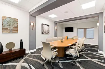 a conference room with a table and chairs at Best Western Plus Concordville Hotel in Concordville