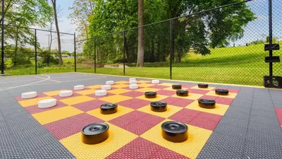 a chess board on a court with cups on it at Best Western Plus Concordville Hotel in Concordville