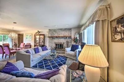a living room with couches and a fireplace at 12 Mi to Hersheypark Family Home with Deck! in Harrisburg
