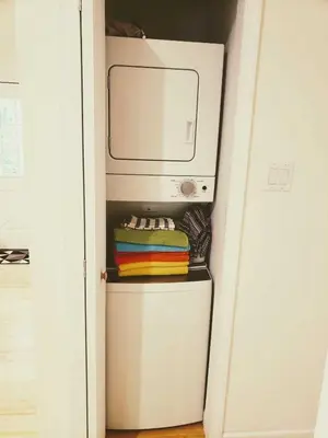 a small white washer and dryer in a room at Sheshequin in Thornhurst