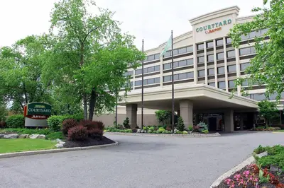 a rendering of a hotel with a building at Courtyard by Marriott Lyndhurst/Meadowlands in Lyndhurst