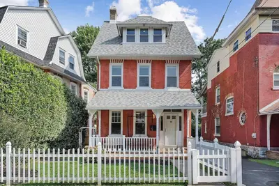 a white picket fence in front of a house at King,Parking,AC,Deck,Train,Uni,Hospital in Bryn Mawr
