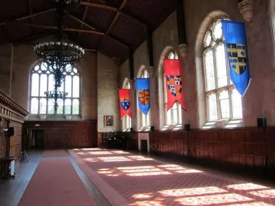 a hallway with flags in a building with windows at King,Parking,AC,Deck,Train,Uni,Hospital in Bryn Mawr