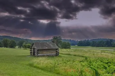 an old cabin in the middle of a field at King,Parking,AC,Deck,Train,Uni,Hospital in Bryn Mawr