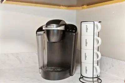 a blender sitting on a counter next to another appliance at FREE Parking Minutes from Center City in Hilltop