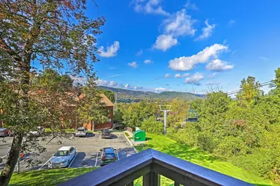 a view of a parking lot from the balcony of a house at Vernon Condo with Deck, Near Appalachian Trail! in Vernon Township