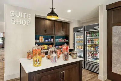 a store with a counter with jars of food at Homewood Suites By Hilton Carlisle in Carlisle