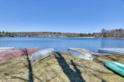 three boats sitting on the shore of a lake at Shared Boat Launch Lake Retreat in Ellenville! in Ellenville