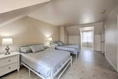 a bedroom with two beds and a window at Peaceful Bird in Hand Home with Farmland Views! in Bird in Hand