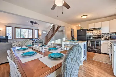 a kitchen and living room with a table and chairs at 4 Mi to Tobyhanna State Park Home with Fire Pit in Tobyhanna