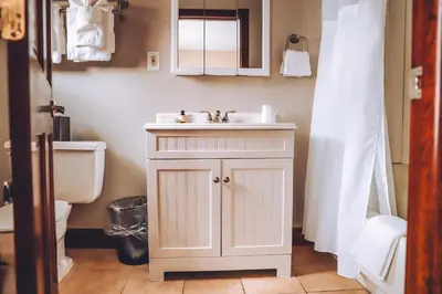 a bathroom with a sink and a toilet at Tom Quick Inn in Milford