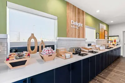 a kitchen with a counter with boxes of food at Spark By Hilton Hershey Near The Park in Hershey