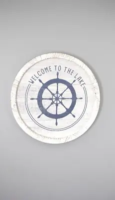 a plate with a wheel with the words welcome to the flux at Lakeside Reflections in Oxford