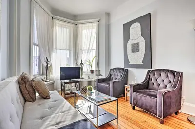 a living room with a couch and two chairs at Contemporary Jersey City Abode about 5 Mi to NYC! in Jersey City