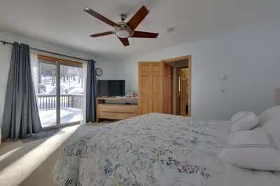 a bedroom with a bed and a ceiling fan at Large Deck and Resort Amenities Lake Ariel Retreat in Lake Ariel