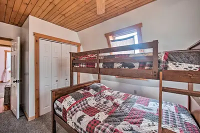 a bedroom with two bunk beds in a house at Rural Dutch Country Retreat - Private Hot Tub in Dalmatia