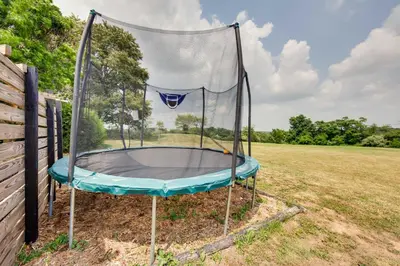 a trampoline in the middle of a field at Rural Dutch Country Retreat - Private Hot Tub in Dalmatia