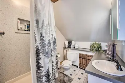 a small bathroom with a toilet and a sink at Rural Dutch Country Retreat - Private Hot Tub in Dalmatia