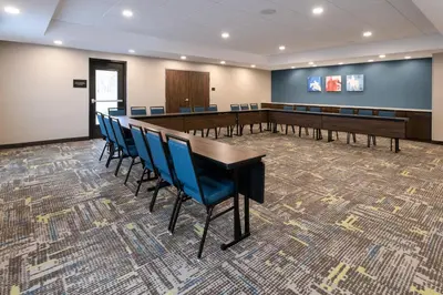 a conference room with a long table and chairs at Hampton Inn Monticello, Ny in Monticello