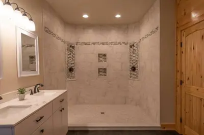 a bathroom with a shower and a sink at The Mountain Lodge in Elliottsburg