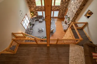 an overhead view of a living room from the loft at The Mountain Lodge in Elliottsburg
