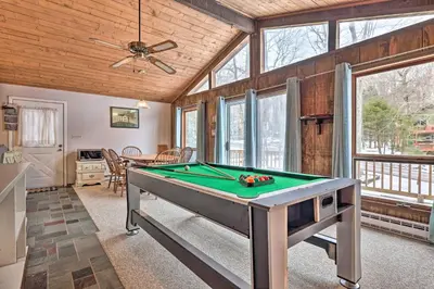 a pool table in a room with a ceiling at Lake Ariel Home Less Than 1 Mi to Roaming Woods Lake! in Lake Ariel