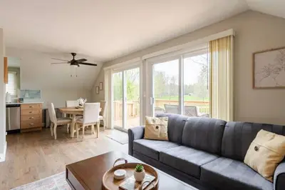 a living room with a couch and a table at Boat House in Downingtown