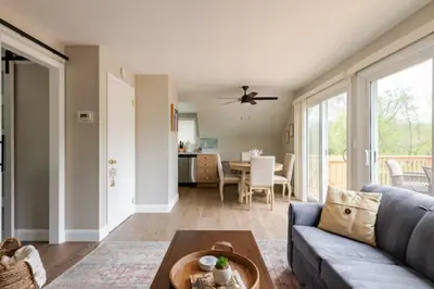 a living room with a couch and a table at Boat House in Downingtown