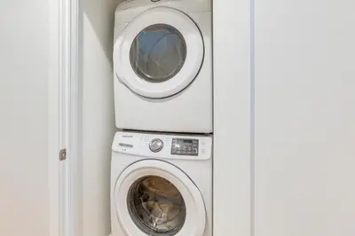 a washing machine and a dryer in a wall at 3-Story Philly Townhouse 2 Mi to University City! in Philadelphia
