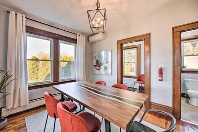 a dining room with a table and chairs at Home 2 Mi to Hersheypark Work and Play! in Hershey
