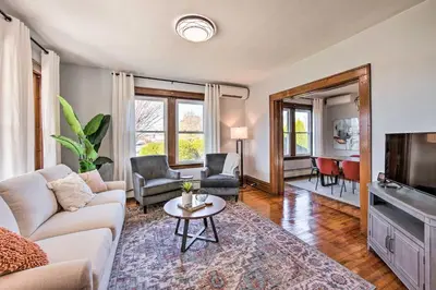 a living room with a couch and a tv at Home 2 Mi to Hersheypark Work and Play! in Hershey